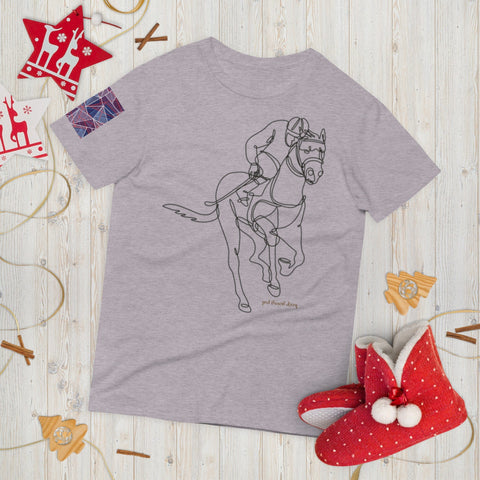 The magickwear "Keep Going" Short-Sleeve T-Shirt, crafted from 100% ring-spun cotton, showcases a minimalist line drawing of a jockey on a horse. When styled with festive red Christmas-themed decor, plush slippers, and star ornaments on a wooden floor, it offers both comfort and style.